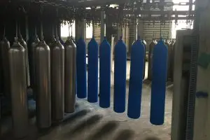Cleaning process to remove dirt, oil, and rust from gas cylinders