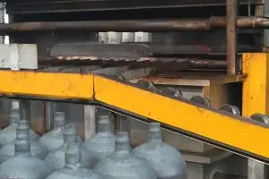 The nosing process shapes a smooth, precise neck